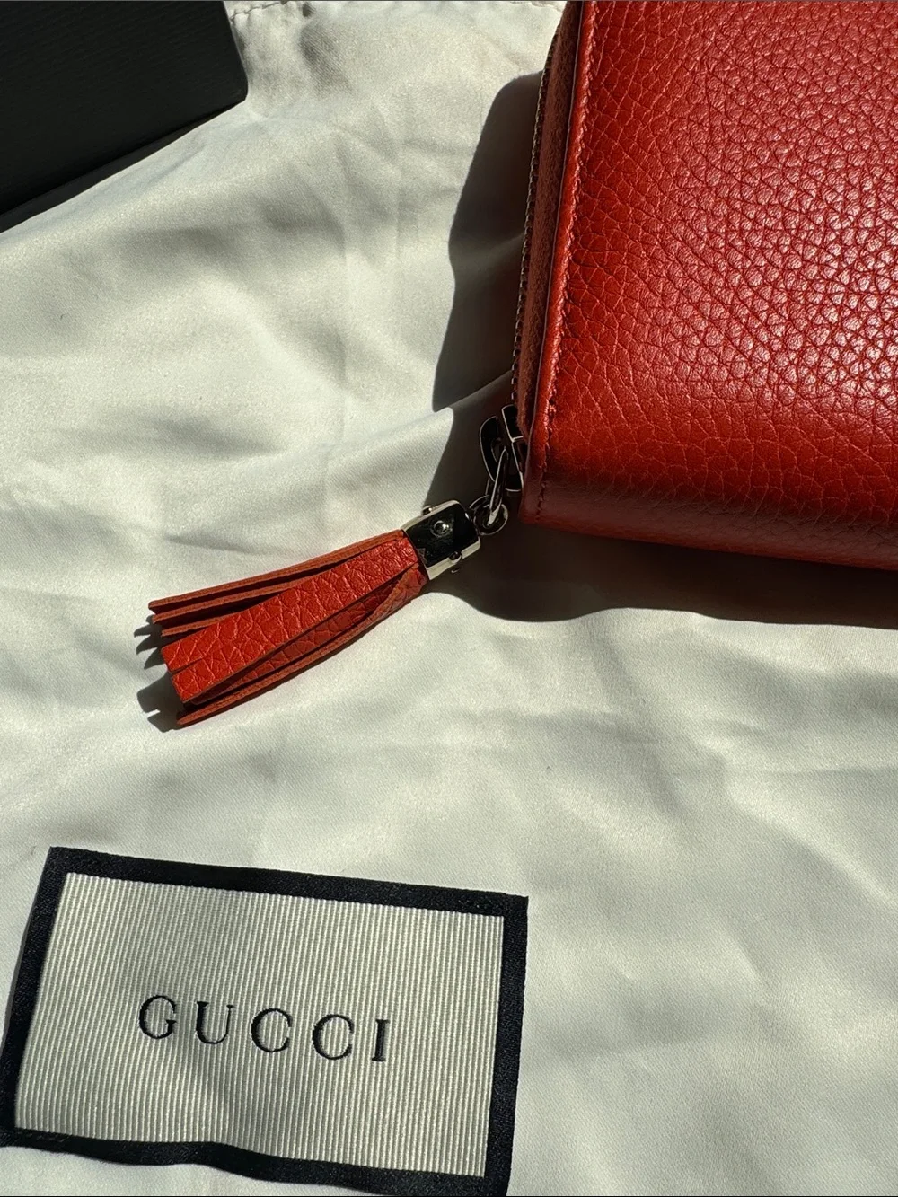 Gucci Orange Pebbled Leather Zip-Around Wallet With Tassle